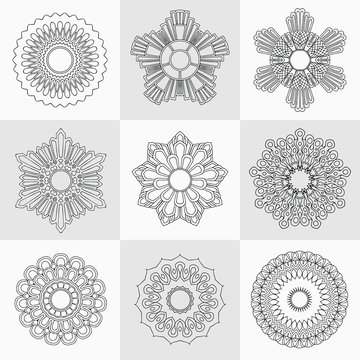 Set of decorative design elements isolated on grey background.  Flowers, snowflakes, abstract floral pattern, star, sun. Vector logo,  sign, stick figures. Floral ornament. Coloring Design template