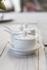 White ceramic jar for enclose coffee or tea flovered