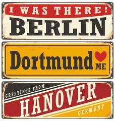 Vintage tin sign collection with German cities