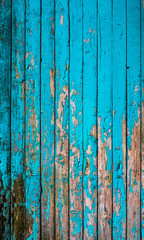 old vintage wooden background in light blue color.
