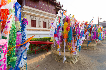 Lanna traditional flags on the sand in songkran festival