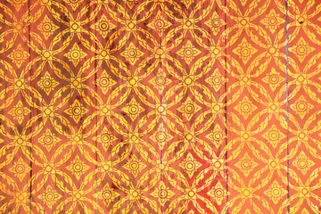 thai style pattern on red wall
