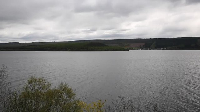 Loch Ness Scotland UK on a cloudy dull overcast day pan view famous tourist attraction