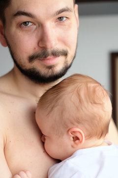 Newborn with his father