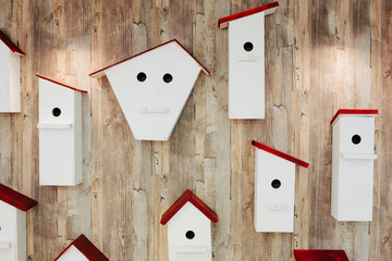 Nesting boxes on the wall. Neighborhood and property concept