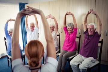 Seniors doing exercises 