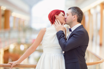 Newlyweds kissing