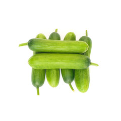Fresh mini cucumbers isolated on white background
