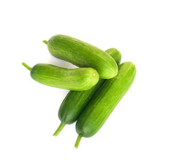 Fresh mini cucumbers isolated on white background