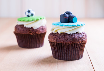 Delicious cupcakes on table
