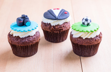 Delicious cupcakes on table