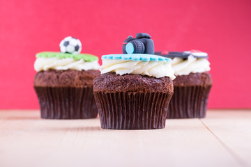Delicious cupcakes on table