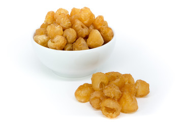 dried longan fruit on white background