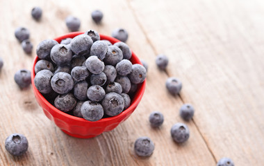 Fresh blueberry on wooden background