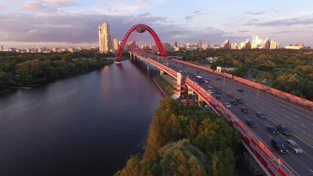Best aerial view ad Red Zhivopisny Bridge in Moscow city, Unique quadcopter views. Eric sunset, Road Traffic. Approach