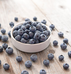 Fresh blueberry on wooden background
