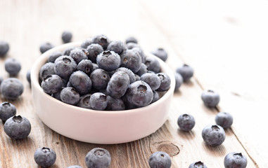 Fresh blueberry on wooden background