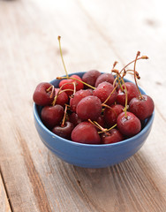 Fresh cherry on wooden table