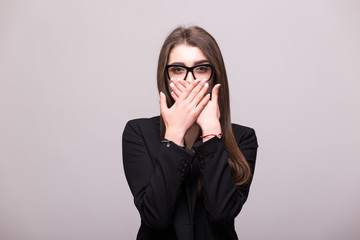 Business woman with surprised gesture on white background