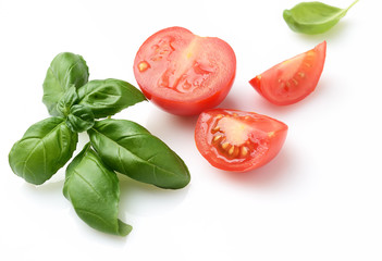 fresh tomato and basil leaf isolated on white background