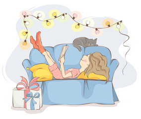 Obraz na płótnie Canvas Christmas Holidays/Young woman or girl is lying on the sofa reading a book, near cat sleeps. All wait the holiday.
