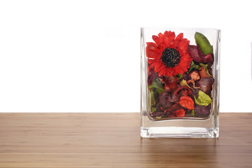 Transparent rectangular glass container of fragrant dried flowers