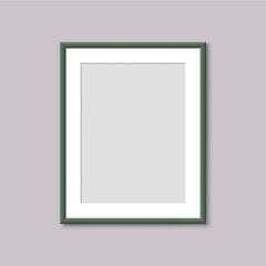 Realistic Empty Green Picture Frame. Realistic vertical frame for paintings or photographs hanging on the wall