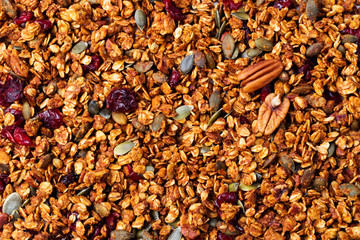 Healthy breakfast. Fresh granola, muesli with pumpkin,pecan nuts,cranberries and maple syrup