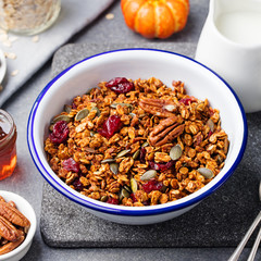 Healthy breakfast. Fresh granola, muesli with pumpkin,pecan nuts,cranberries and maple syrup