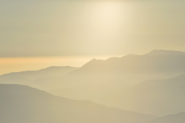 Foggy landscape in sunset light