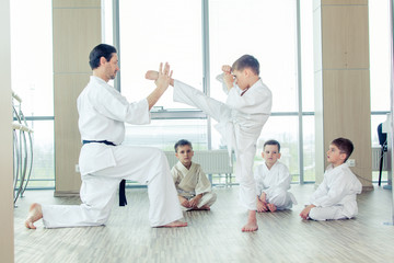 young, beautiful, successful multi ethical kids in karate position © satyrenko