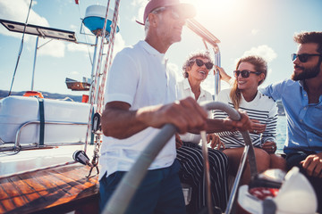 Group of people enjoying a summer day on a boat