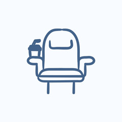 Cinema chair with disposable cup sketch icon.