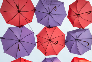 Hanging colorful decorative umbrellas, view from below