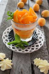 Naklejka na ściany i meble summer dessert with apricots and yoghurt