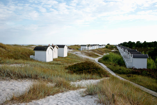 Wooden bathing houses in a row