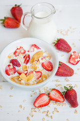Porridge with fresh strawberry and milk