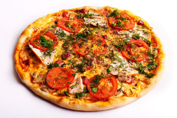 Pizza with ham, tomatoes and mushrooms isolated on white