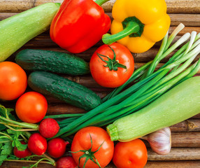 
Healthy food from village. Eco food concept. Fresh organic vegetables on wood table in the garden.