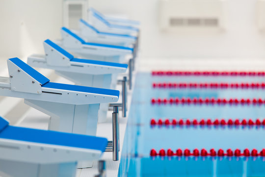 Starting blocks and lanes in a swimming pool