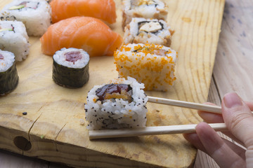 Fresh Homemade Sushi Roll against a background