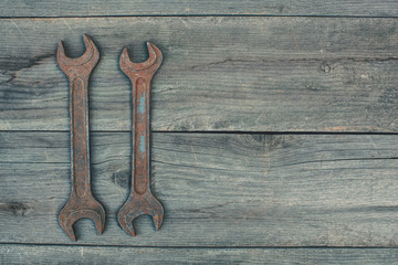 On the old, wooden, cracked, the working surface in the workshop