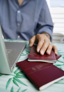Hand on passport