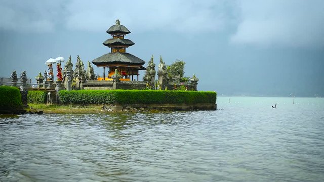 Temple Pura Ulun Danu Bratan, or Pura Bratan, is located on the shores of Lake Bratan in the mountains near Bedugul, is a major Shivaite and water temple of Bali, Indonesia. Full HD Video 1920x1080