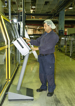 Man standing by dashboard