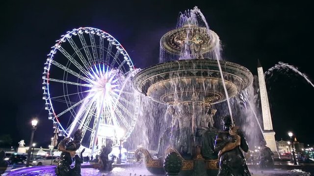 Fountain avant roue de paris at night in Paris