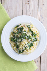Spaghettis with spinach and Parmesan.