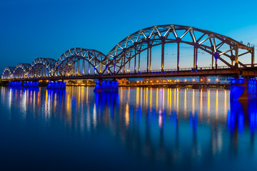 Fototapeta premium Railway bridge at twilight in Riga, Latvia
