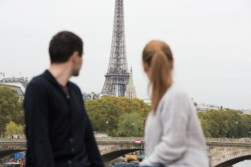 young couple in Paris on the bridge