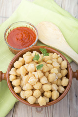 cooked chickpeas with tomatoes in a bowl
